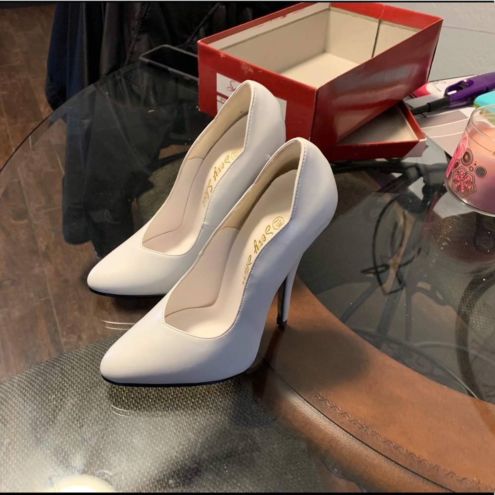 White stiletto pumps